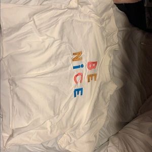 “BE NICE” graphic shirt